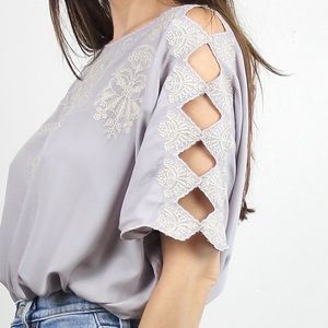 Cutout sleeve embroidered blouse